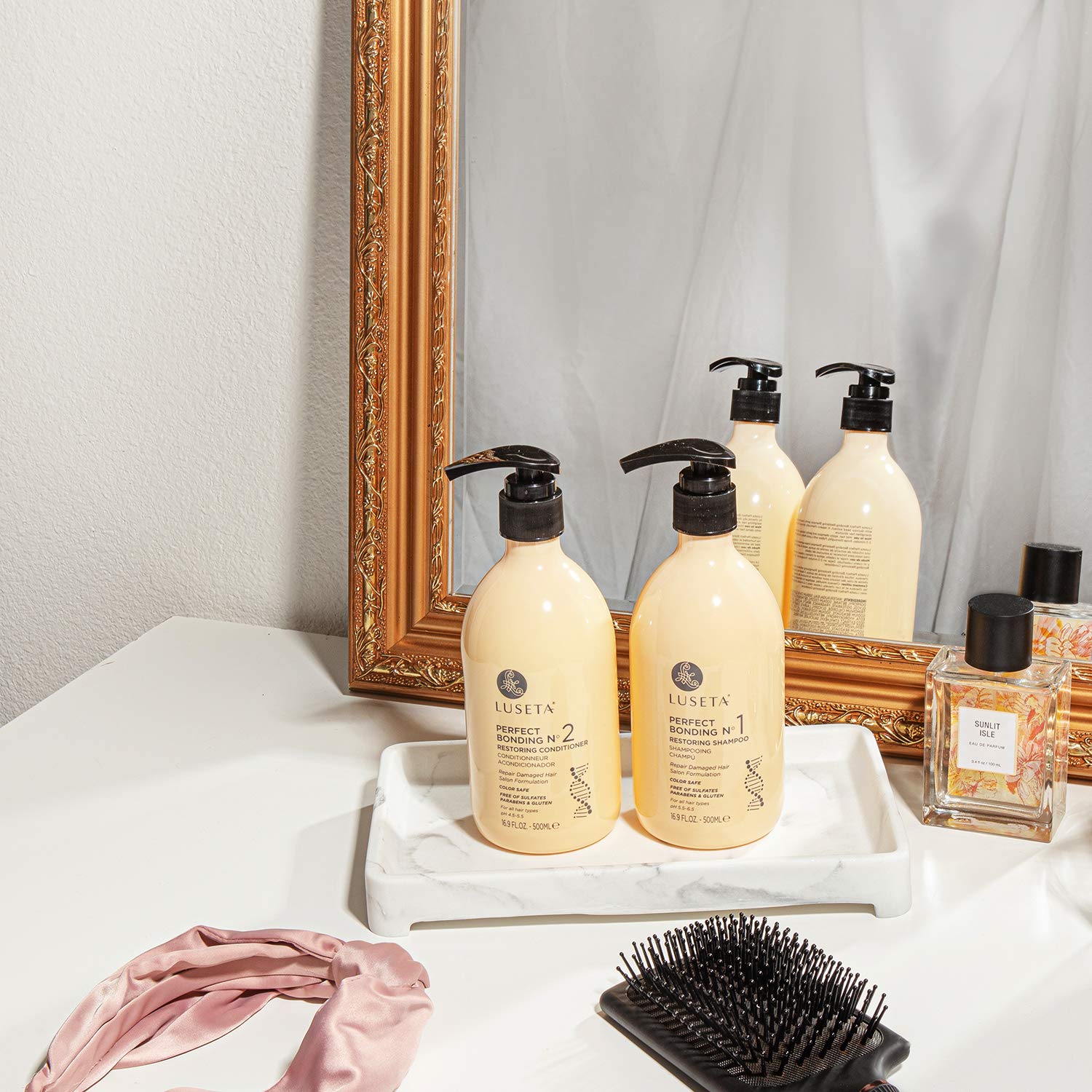 Luseta shampoo foam on hand, showcasing rich lather that rinses clean without residue.