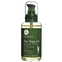 Luseta Tea Tree Oil bottle pour for easy scalp and hair application.