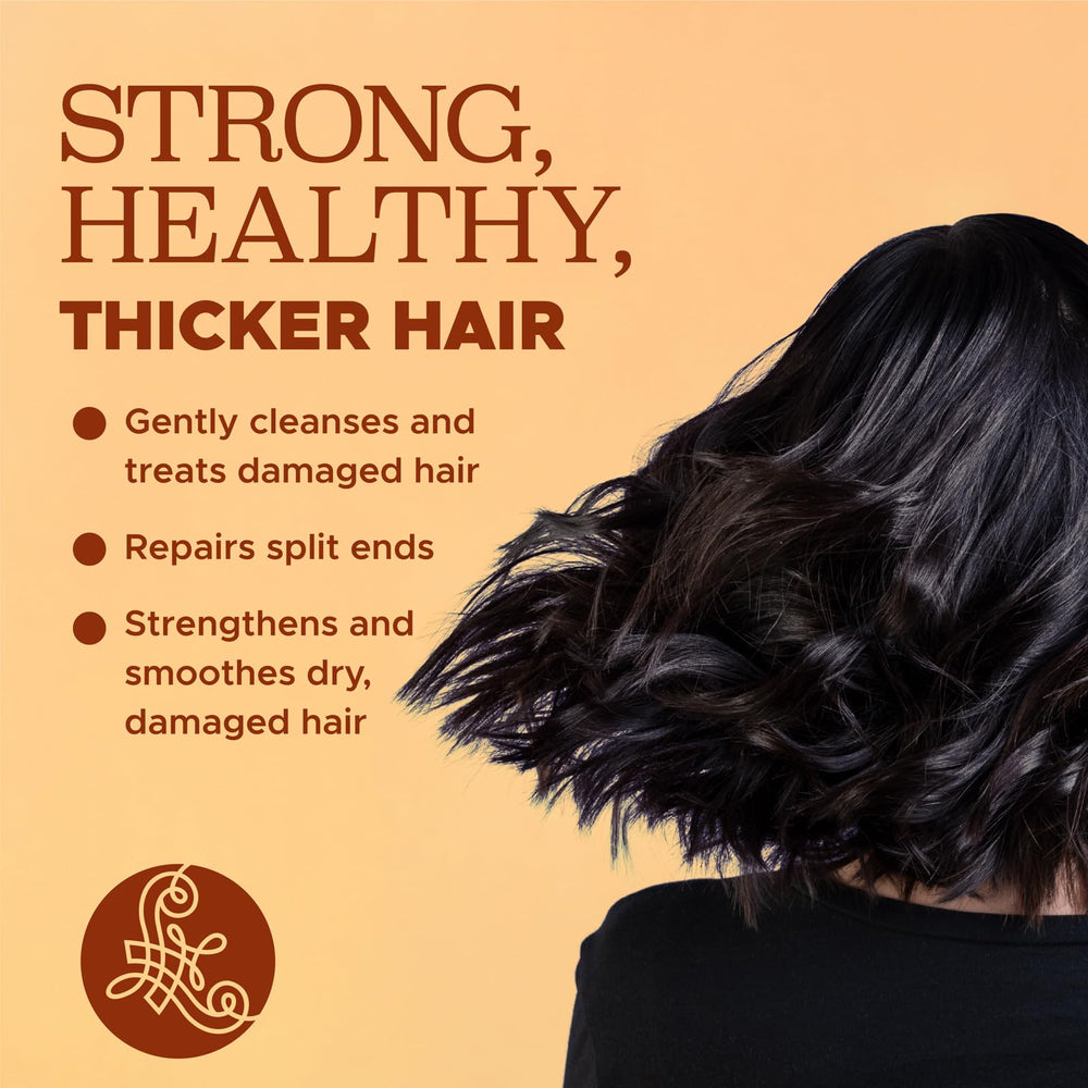 Luseta turmeric collagen conditioner bottle promotes smoother, fuller-looking hair.