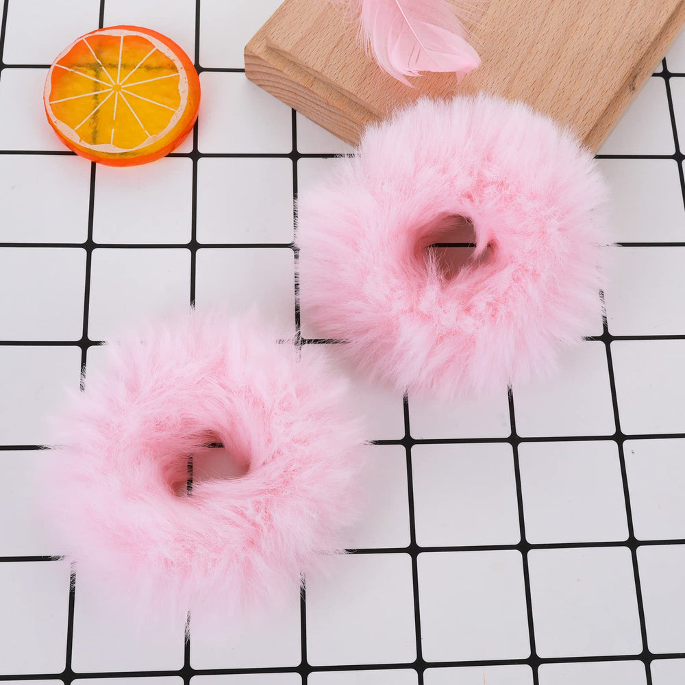 Lusofie pink pompom hair tie closeup showing soft faux rabbit fur texture
