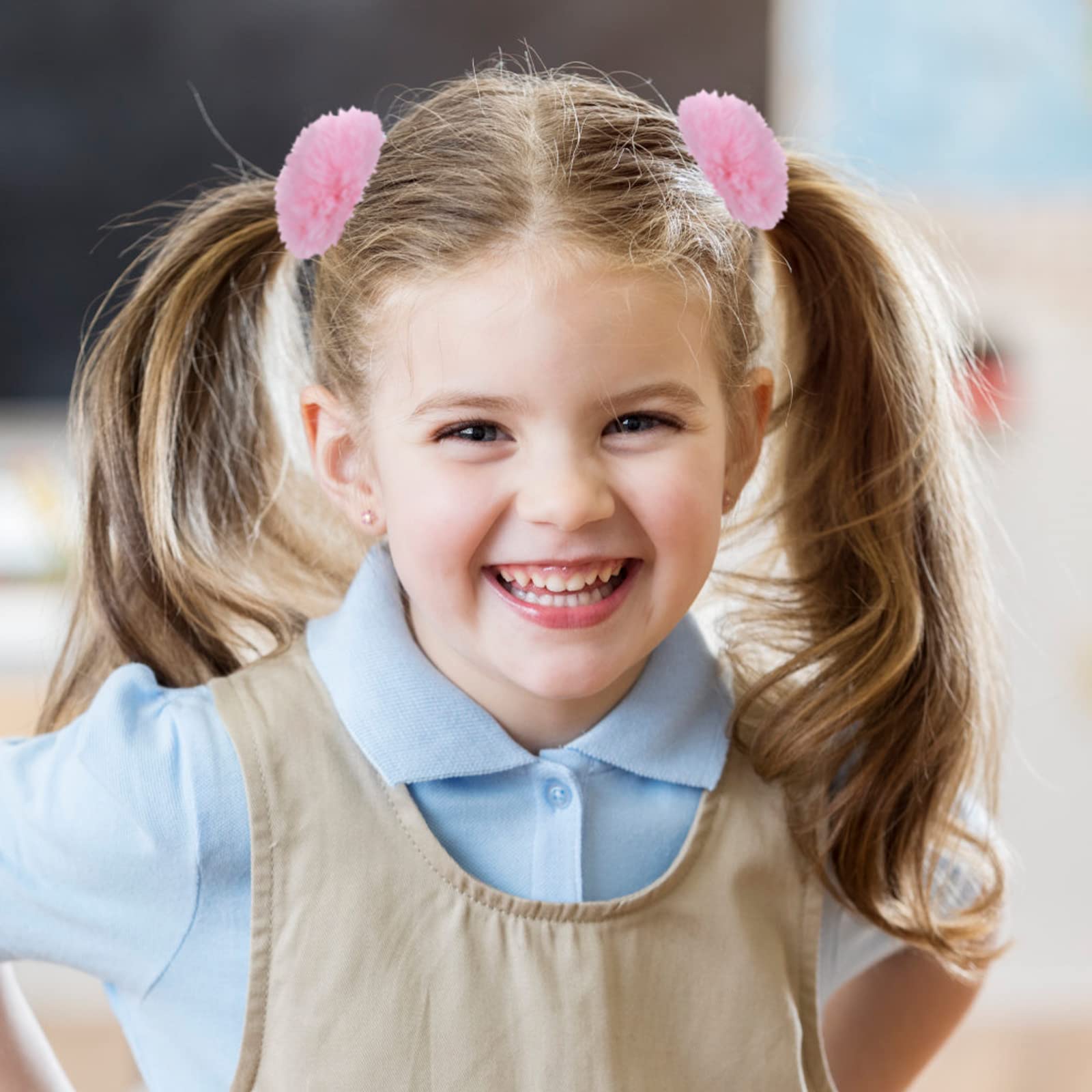 Lusofie pink pompom hair tie with detailed stitching and durability