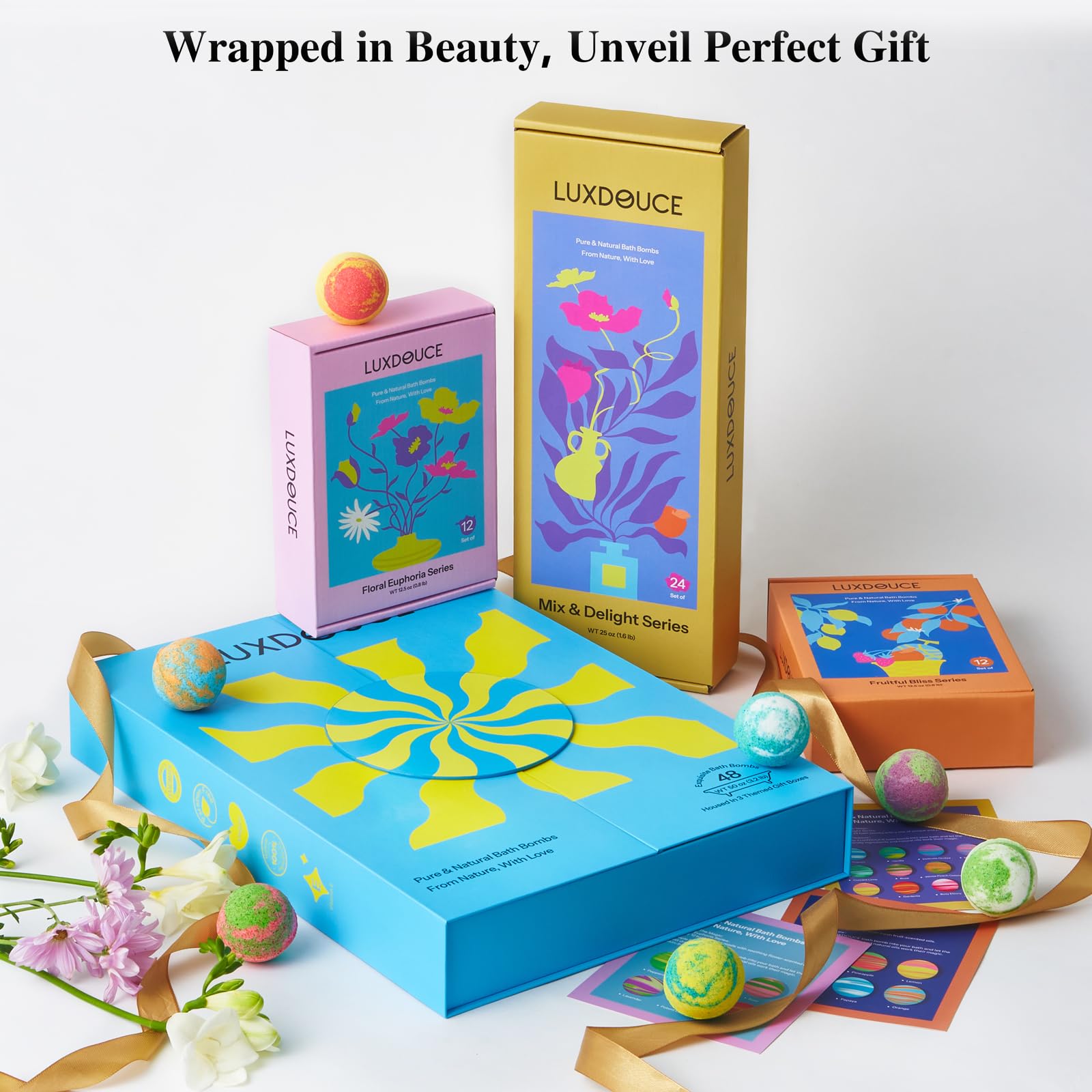 LUXDOUCE bath bombs dissolving in tub with vivid colors and scent.