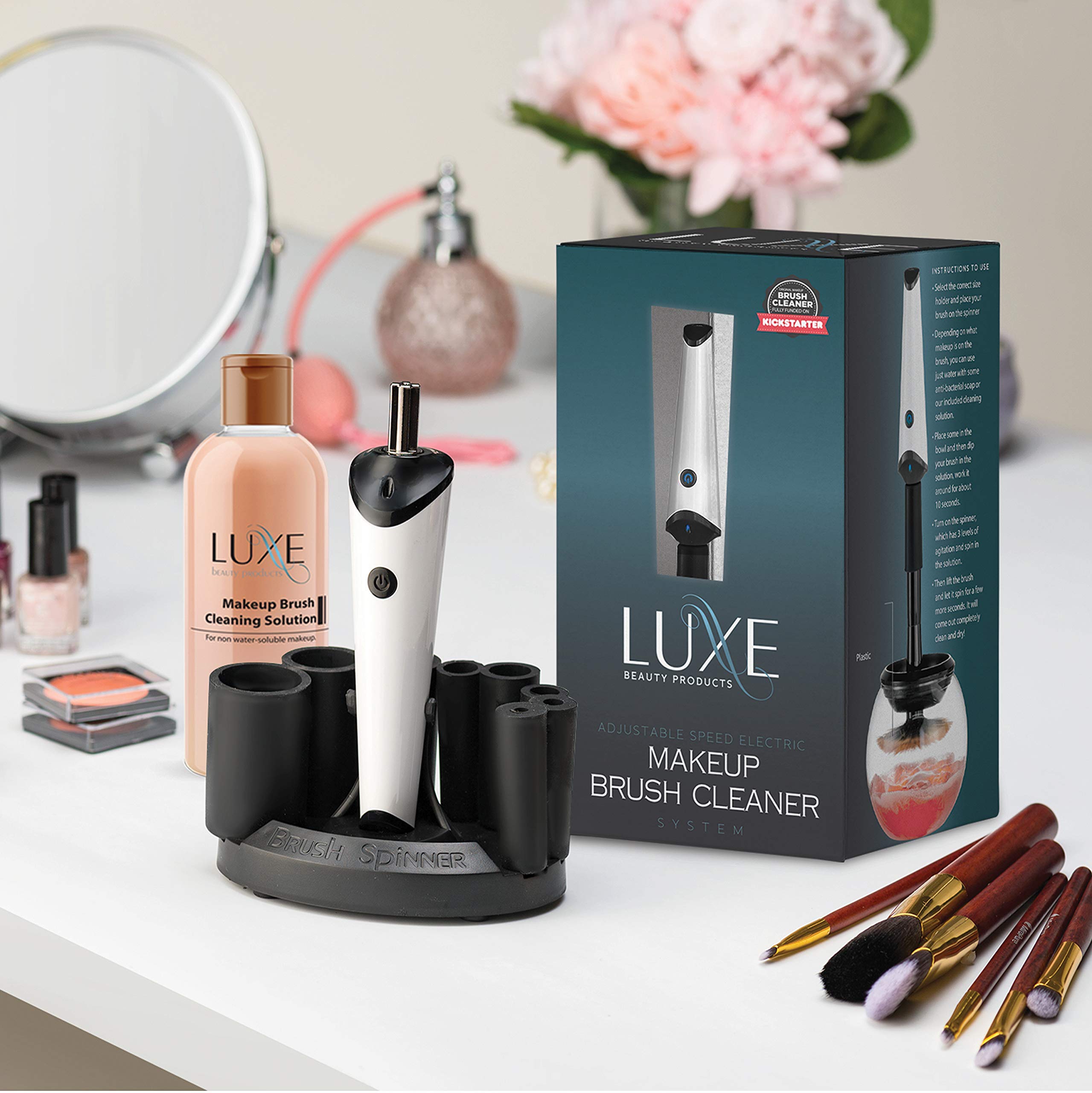Luxe electric brush cleaner dock shows fast spin and dry action