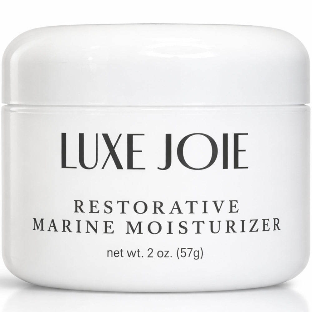LuxeJoie Restorative Marine Moisturizer bottle highlighting lightweight hydration for sensitive skin