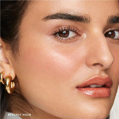 M Flush Balm Cream Blush on cheek for seamless blend and natural glow.