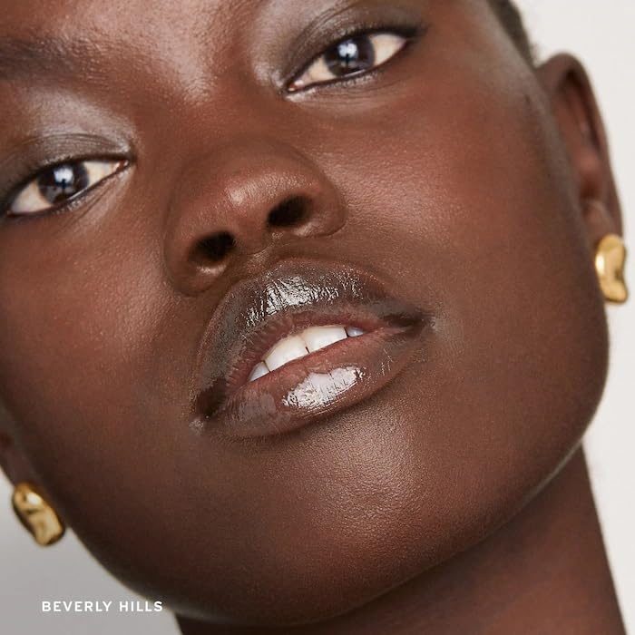 M Flush Balm Cream Blush on lips provides subtle color and moisture.