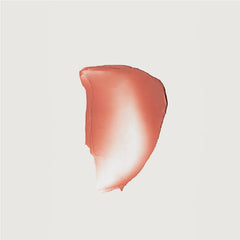 M Flush Balm Cream Blush soft peach swatch highlights buildable color on skin.
