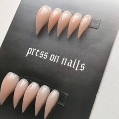 MABKJLF complete nail kit includes glue, file, stickers, stick, and storage box.