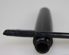 MAC mascara wand close-up highlights the thick brush for fuller lash look.