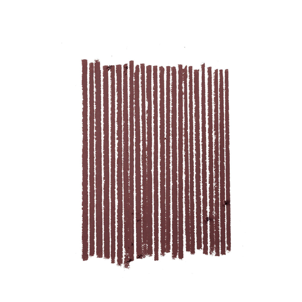 Close-up texture of Mahogany pencil glides smoothly.
