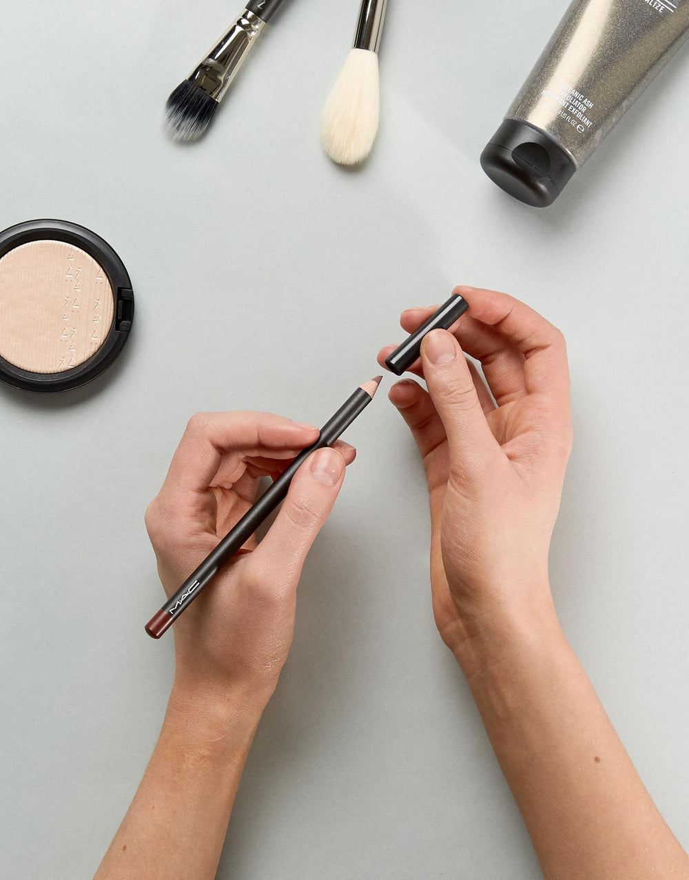 MAC Lip Pencil Mahogany complements warm skin tones.