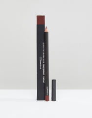 MAC Lip Pencil Mahogany swatch on arm shows rich, even color.