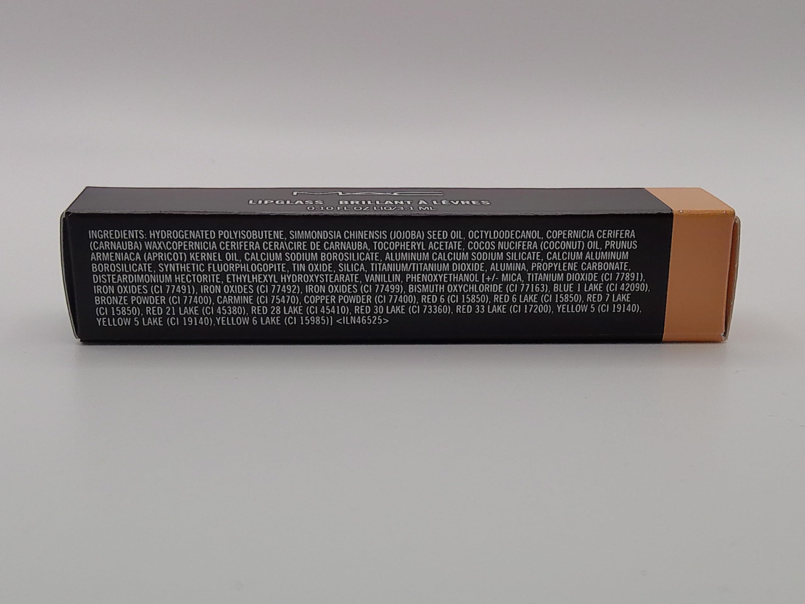 MAC Lipglass C-THRU worn over lip pencil enhances shine and color.