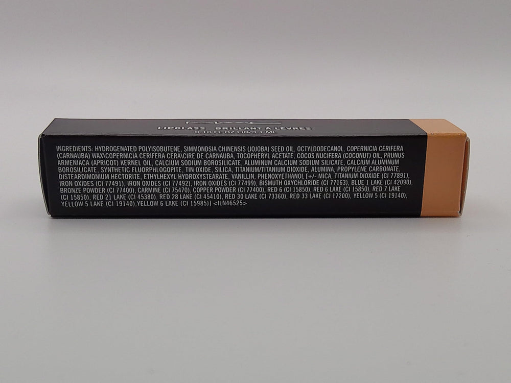 MAC Lipglass C-THRU worn over lip pencil enhances shine and color.