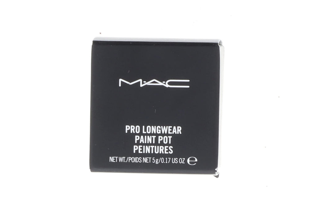 Close up of MAC Paint Pot Soft Ochre being blended for seamless color