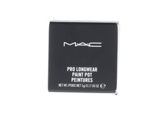 Close up of MAC Paint Pot Soft Ochre being blended for seamless color