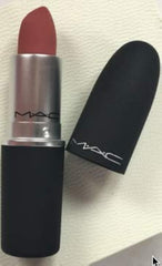 MAC Powder Kiss Lipstick Mull It Over swatch with a soft matte finish for a natural look