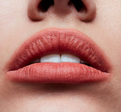 MAC Powder Kiss Lipstick packaging closeup highlights sleek design and shade context