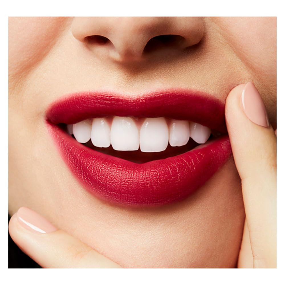 MAC Powder Kiss Liquid Lipcolour Burning Love berry shade on lips in natural light.