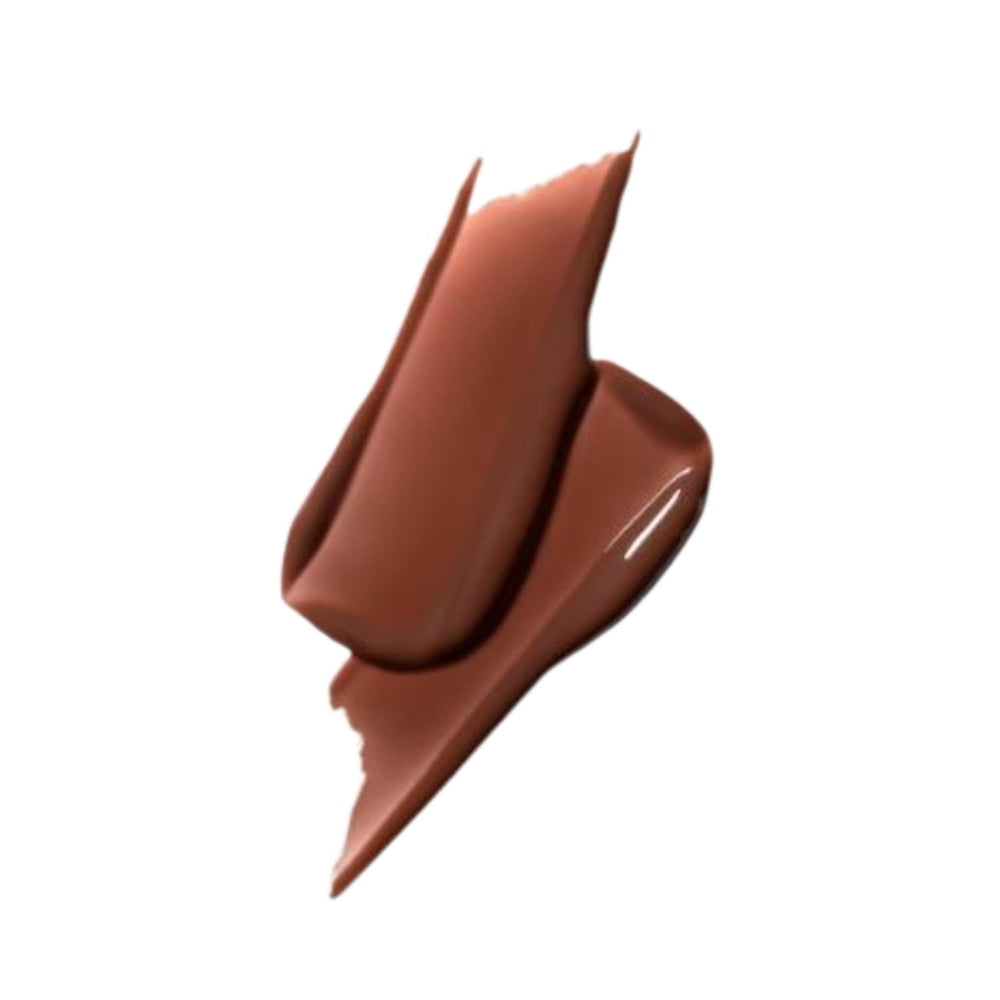 Close-up swatch of MAC Squirt gloss in creamy brown tint