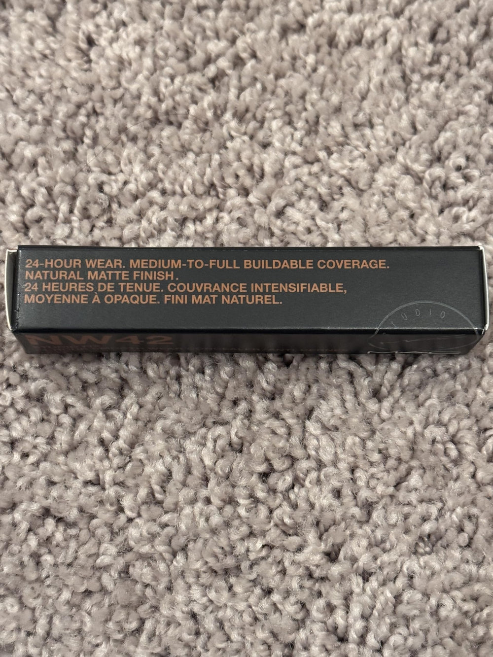 MAC Studio Fix Concealer NW42 blemish cover close-up on skin texture.