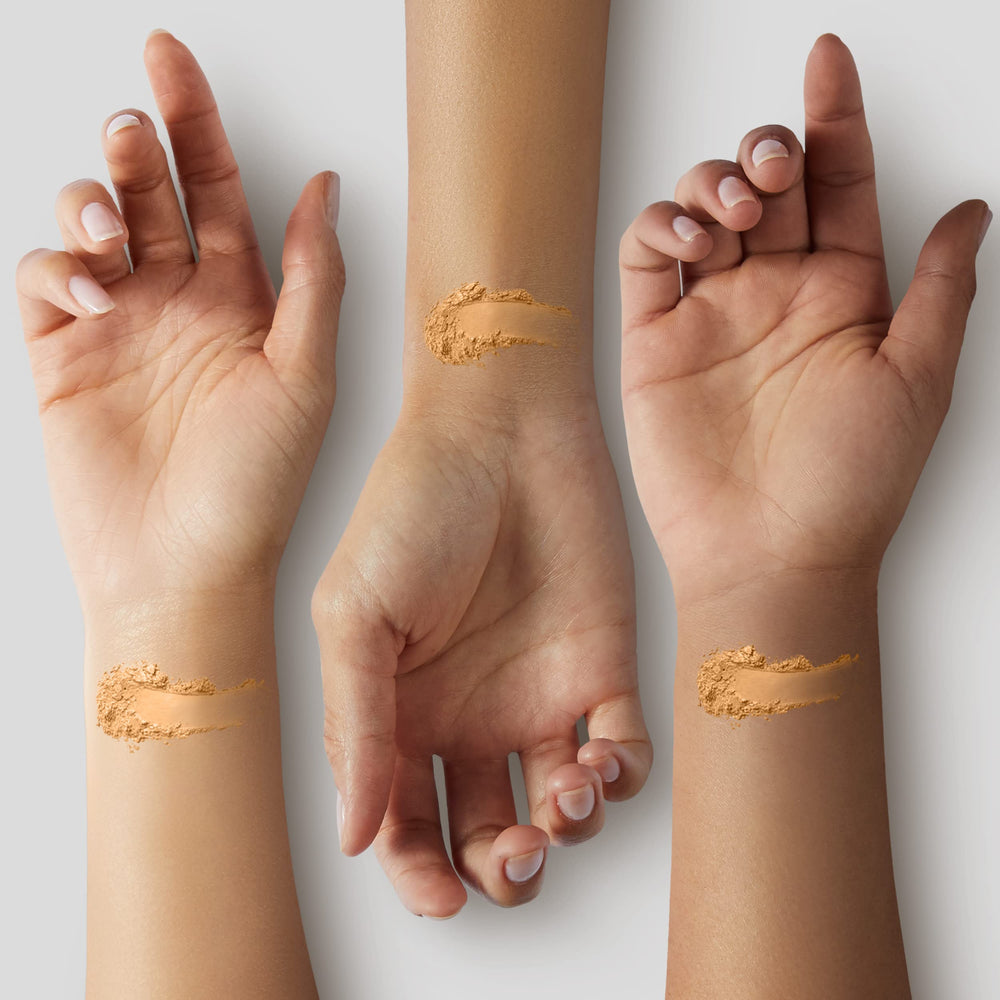 Close-up texture of MAC Studio Fix Powder Foundation NW43 reveals finely milled powder.