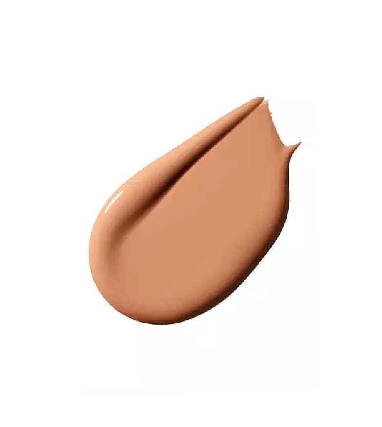 MAC Studio Radiance concealer application close-up demonstrates smooth, medium-buildable coverage.