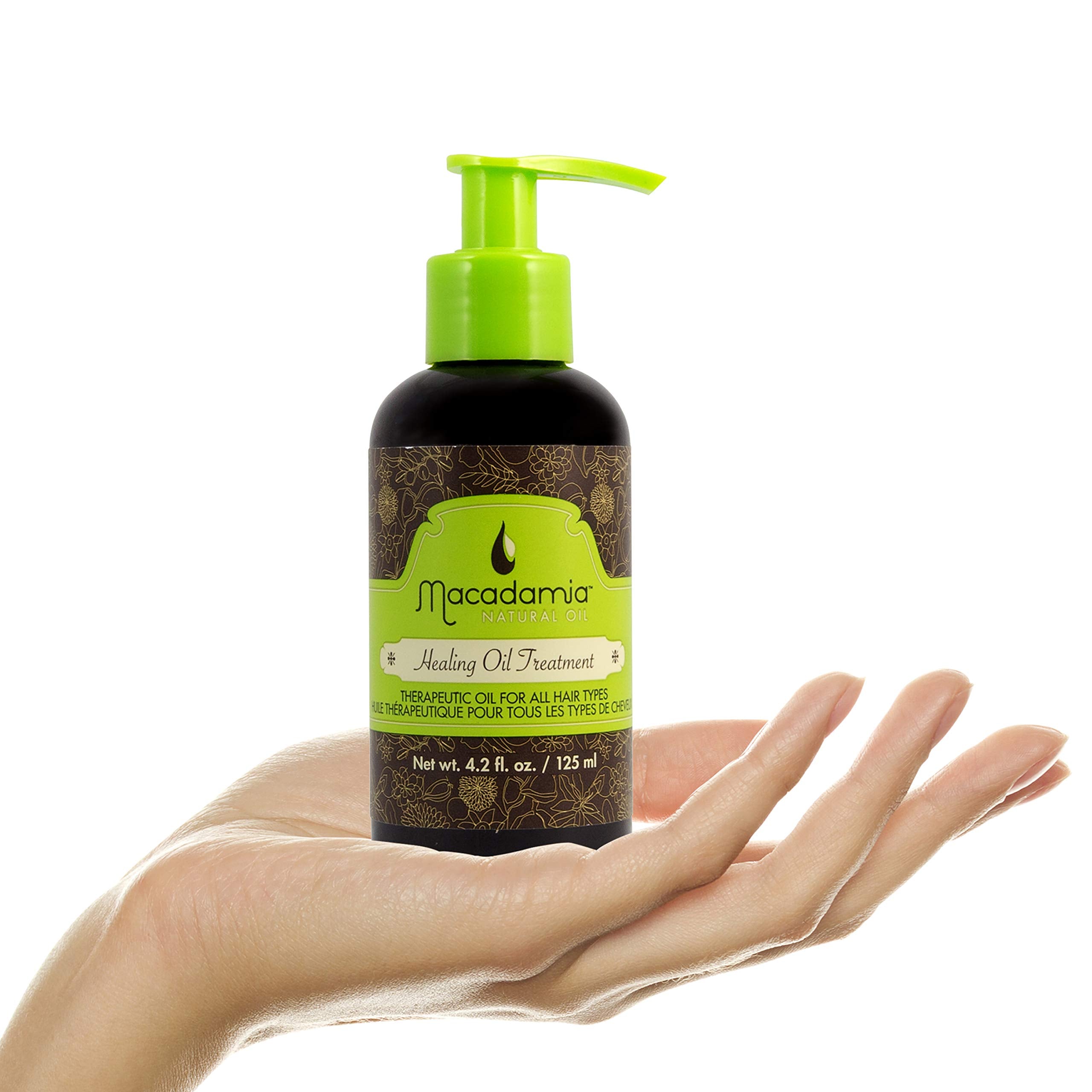 Hands apply a few drops for daily hair care routine