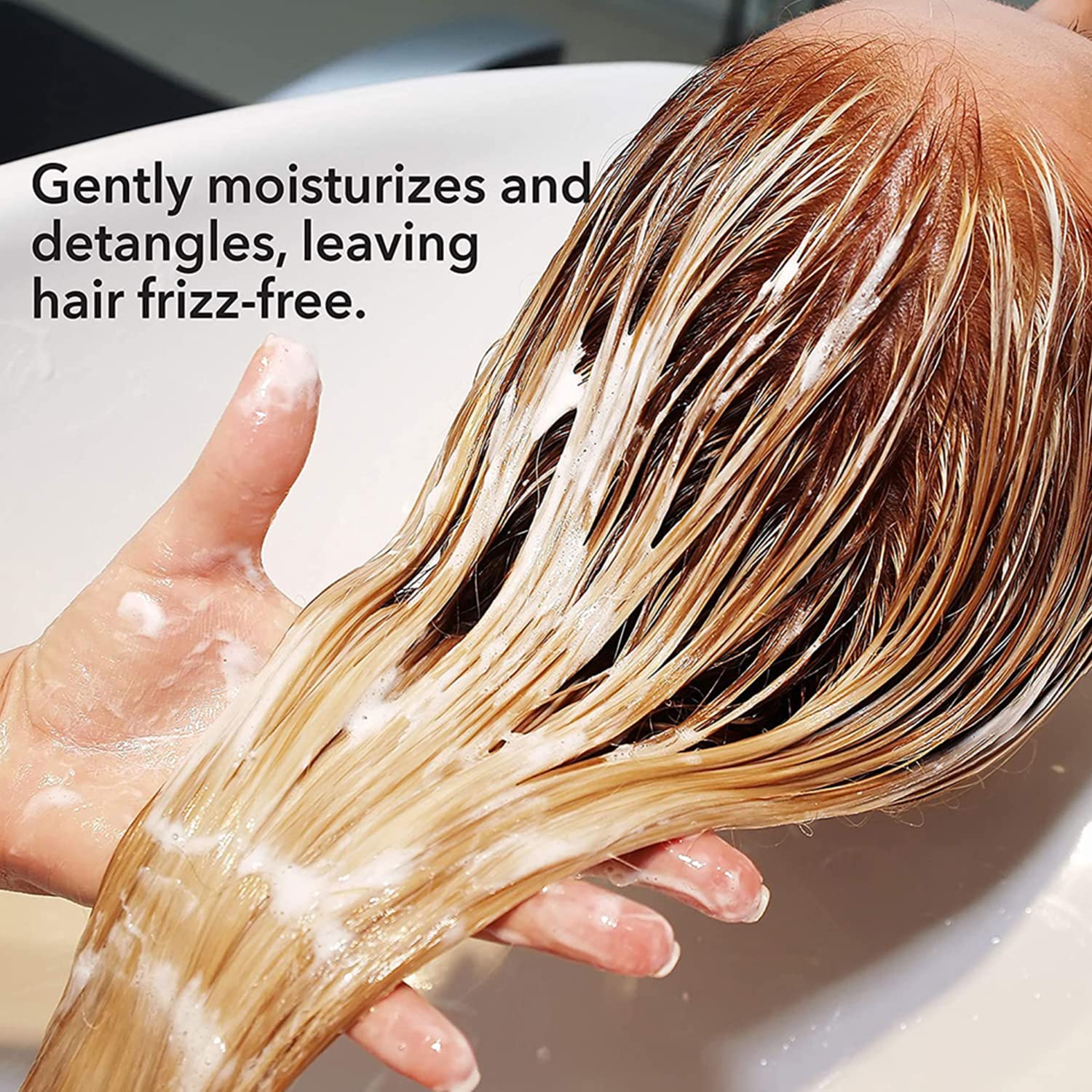 Macadamia Natural Oil Smoothing Conditioner side label highlights hydrating formula
