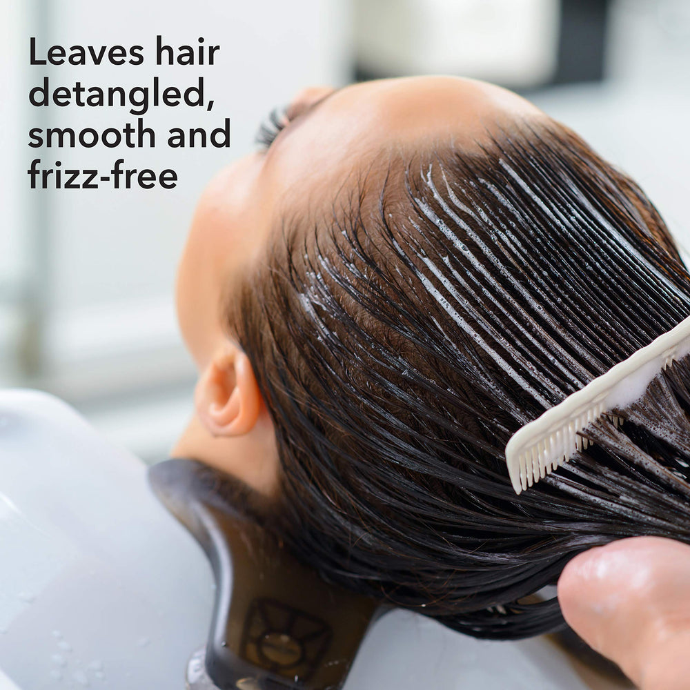 Macadamia Professional Weightless Repair Masque model hair appears smooth and strengthened.
