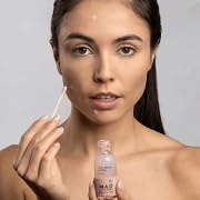Before-after style image suggesting blemish improvement with M.A.D Skincare