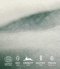 MADARA AHA fruit acids exfoliation close-up, gently buffing dull texture.