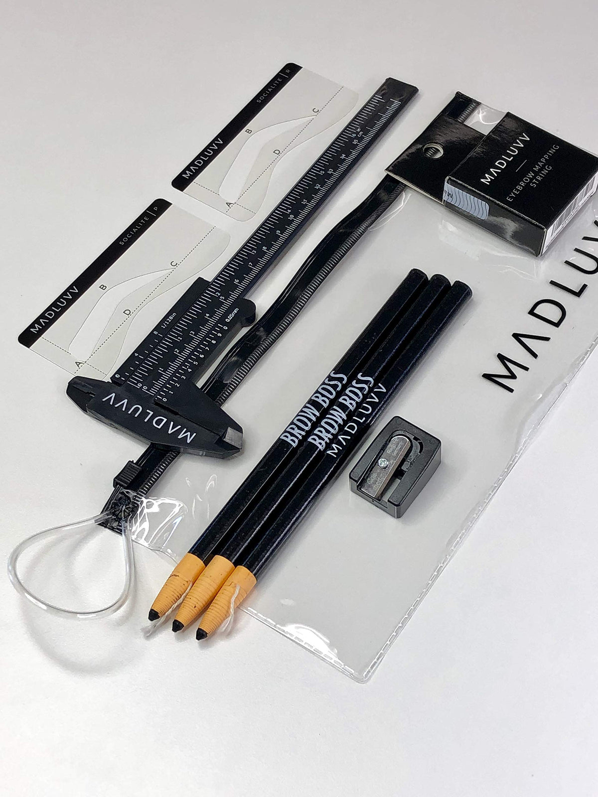MADLUVV Brow Mapping Kit contents laid out for precise brow mapping and professional setup.