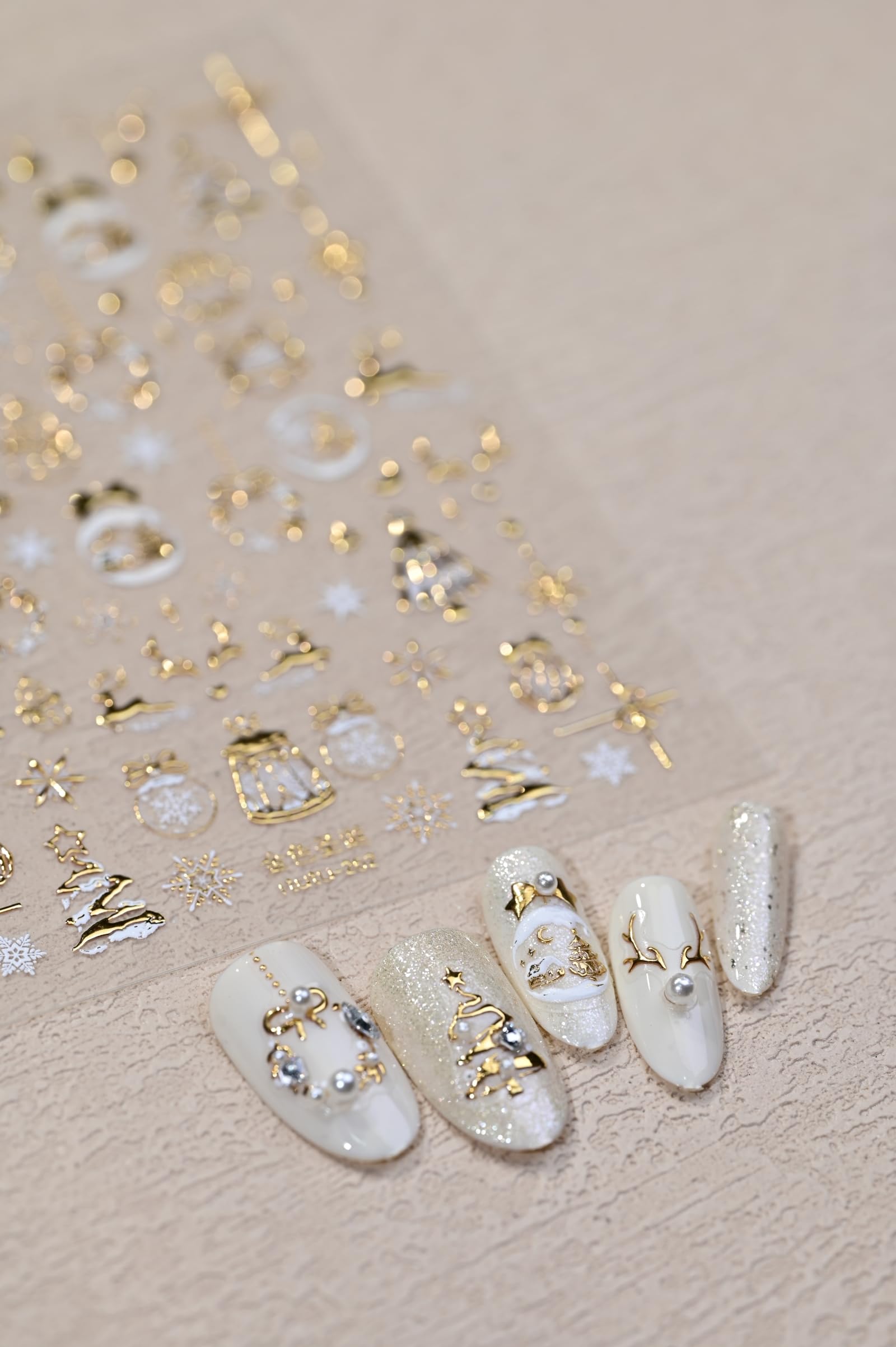 Maigitur pearl wreath decal creates subtle elegance on winter nails