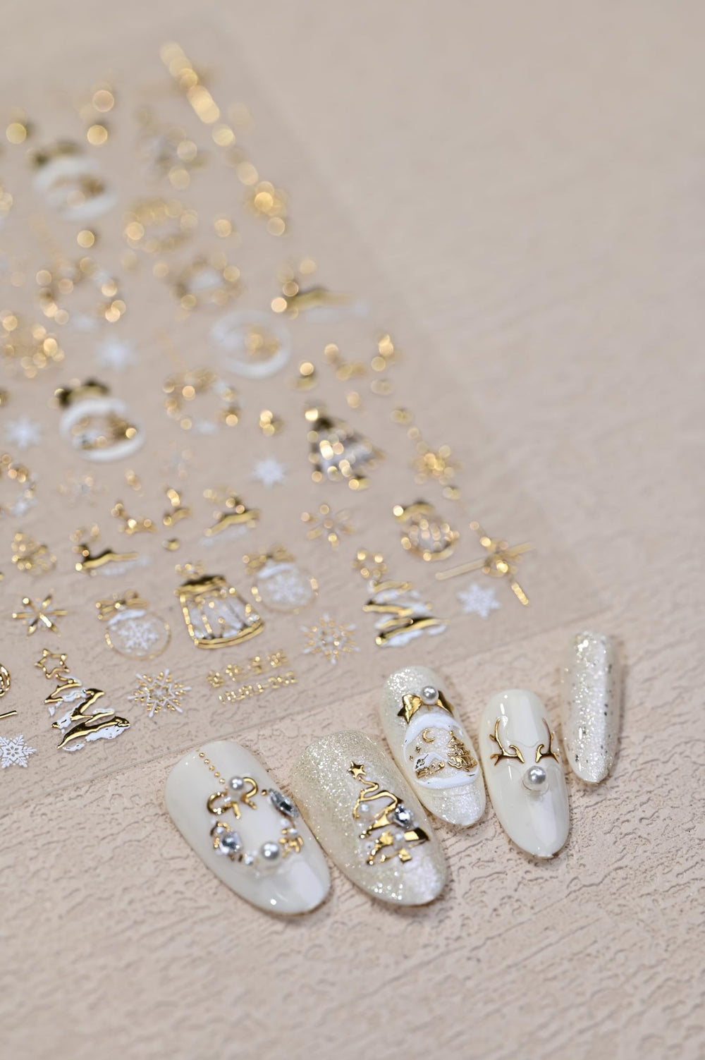 Maigitur pearl wreath decal creates subtle elegance on winter nails