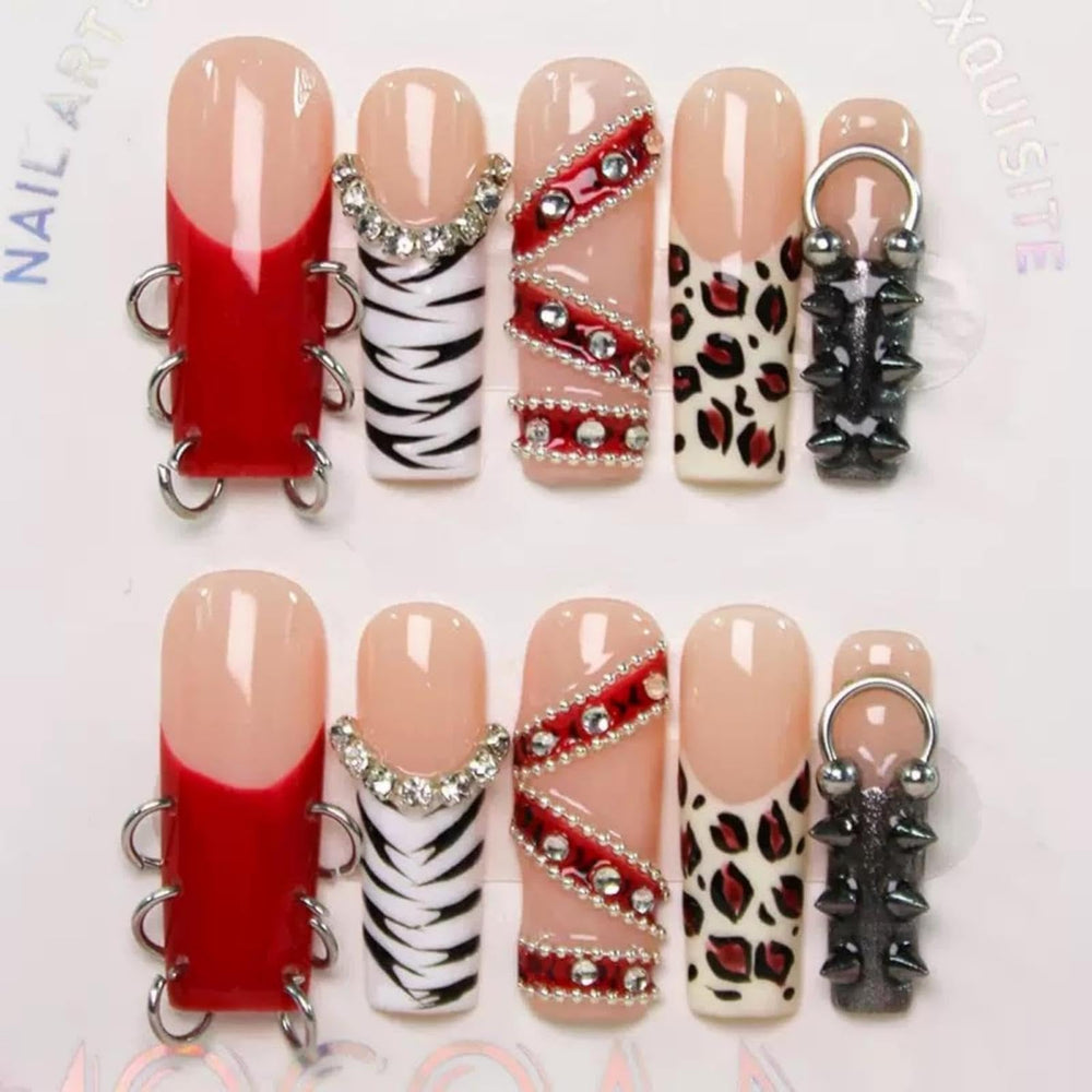 Maigitur 5D press-on nails with red French tip and leopard rhinestones.