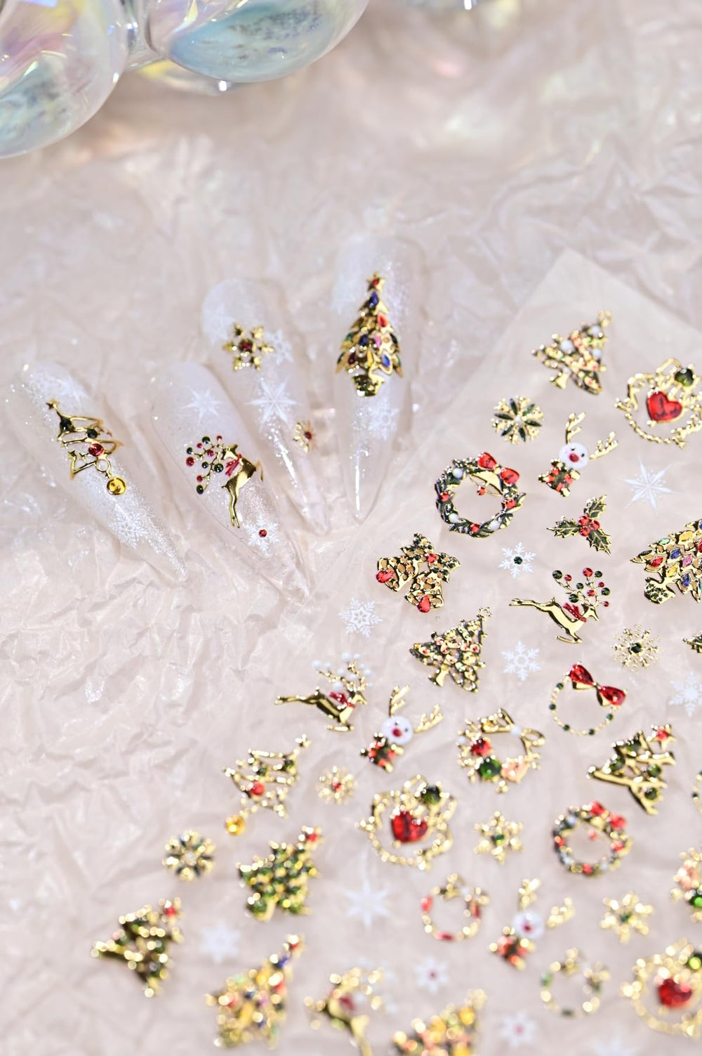 Maigitur ornamental gold motifs nails for chic holiday looks