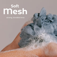 MainBasics Airy Blossom loofah mesh texture emphasizing premium exfoliating results
