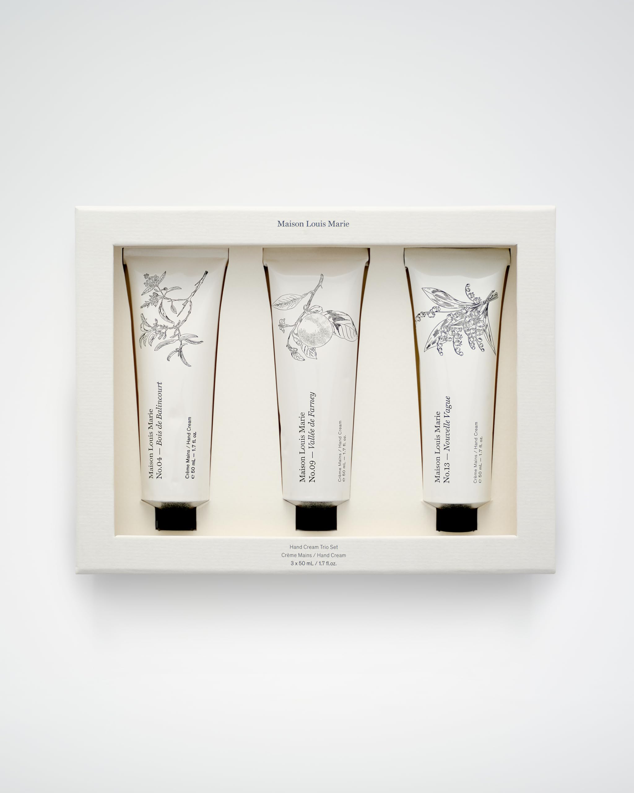 Dispensed Maison Louis Marie cream on hand demonstrating light texture.