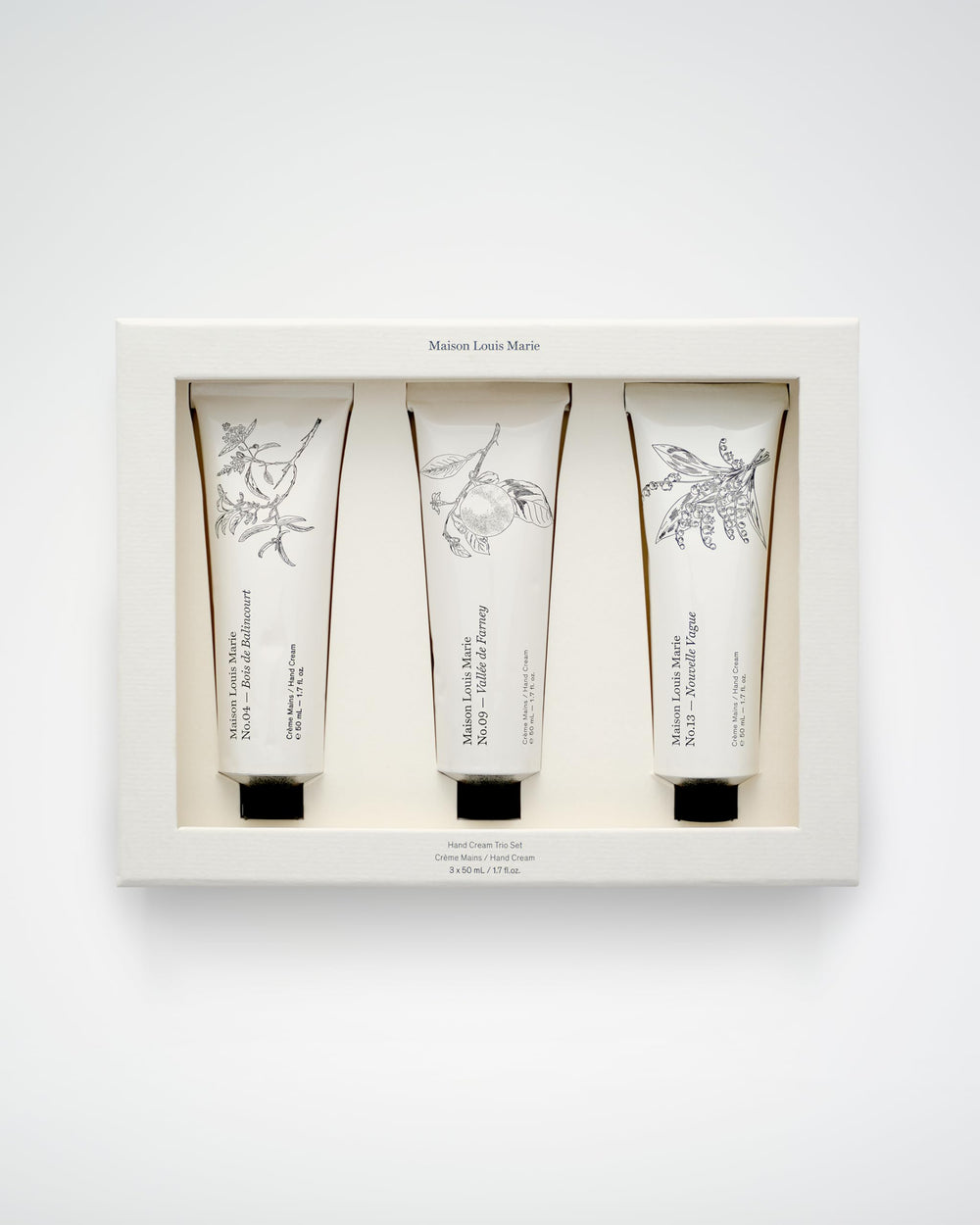 Dispensed Maison Louis Marie cream on hand demonstrating light texture.