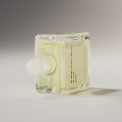 Maison Louis Marie Icila pulse-point use demonstrates neck, chest, and wrist application.