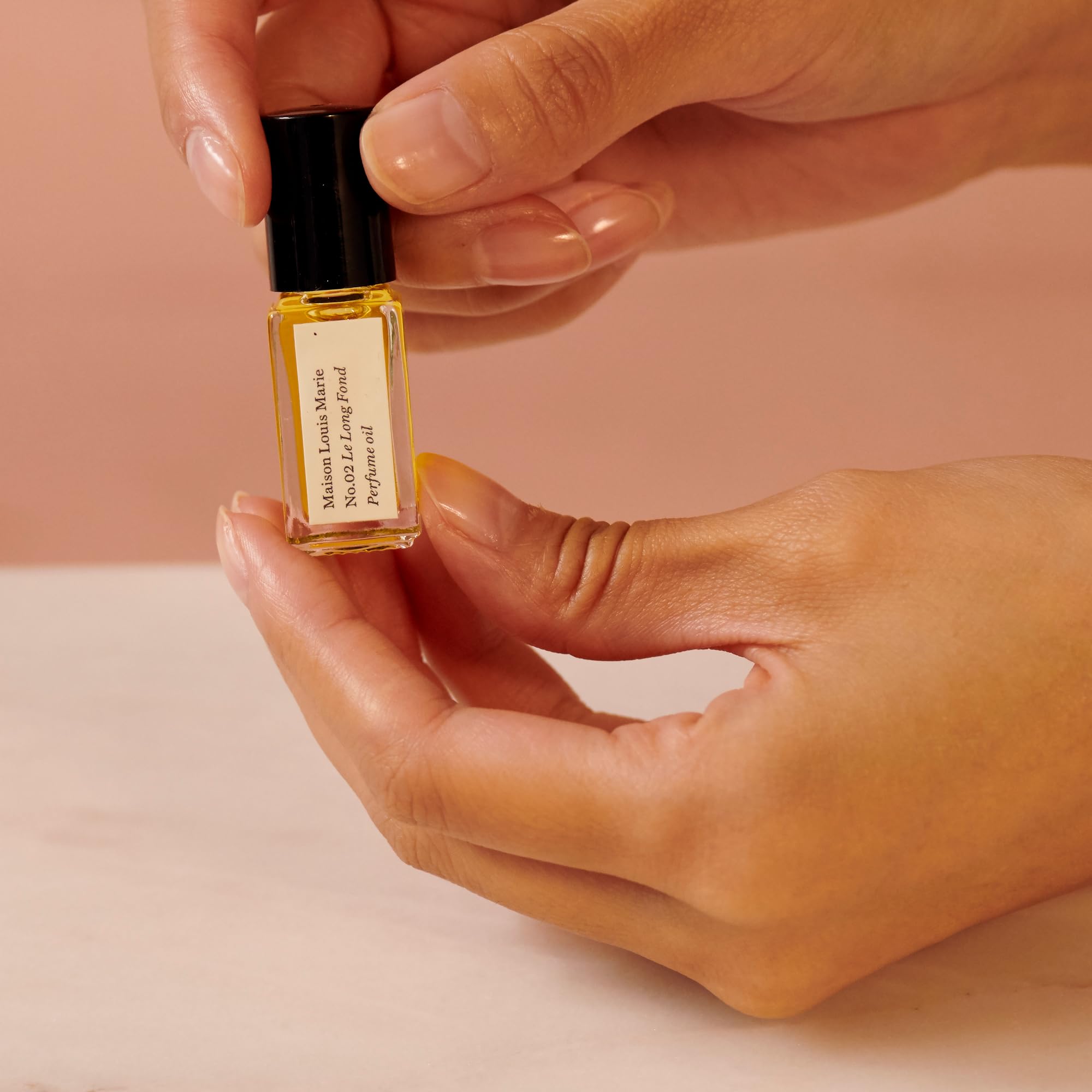 Maison Louis Marie No.02 Le Long Fond swatch shows warm amber and hinoki hints