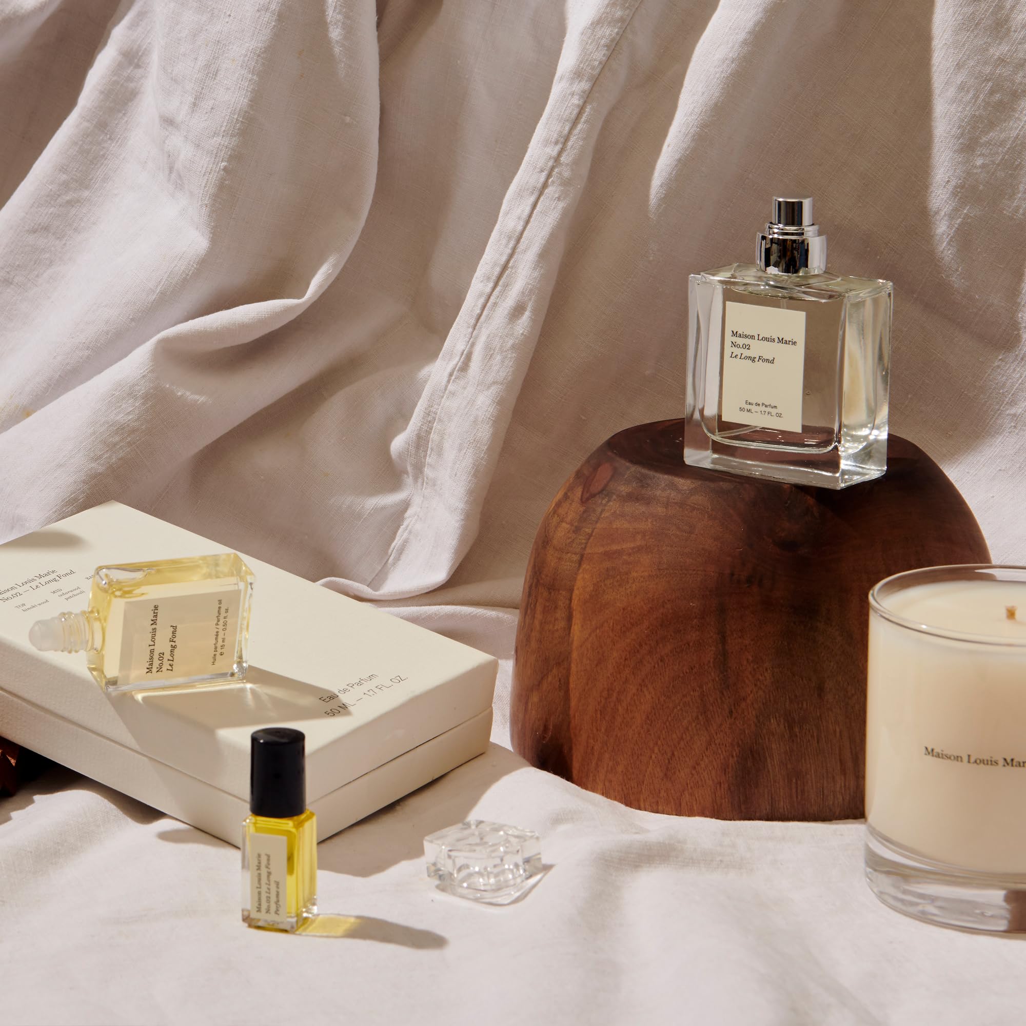 Lifestyle shot of No.02 Le Long Fond in purse for daily fragrance ritual