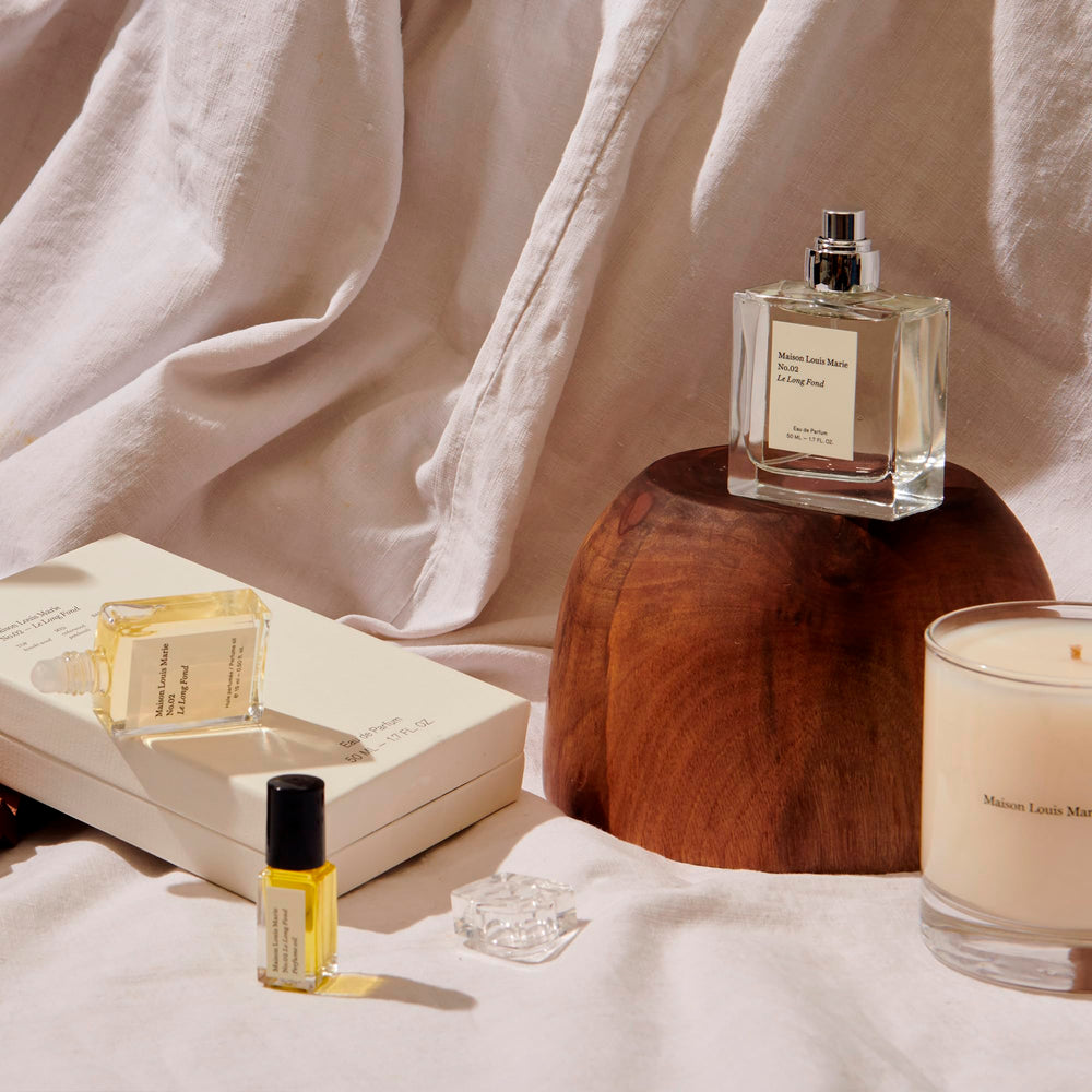 Lifestyle shot of No.02 Le Long Fond in purse for daily fragrance ritual