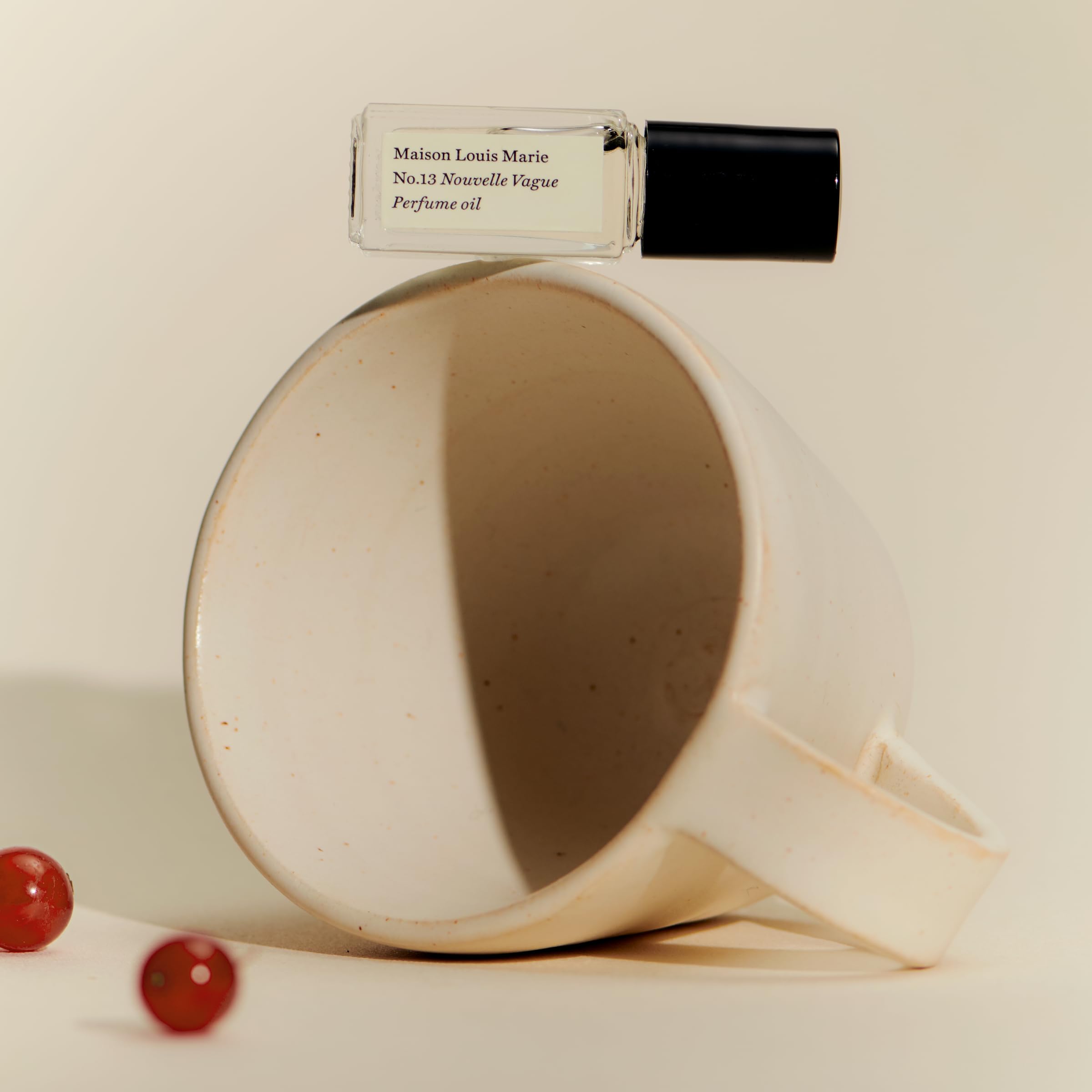 Maison Louis Marie No.13 Nouvelle Vague on pulse points for refined scent.