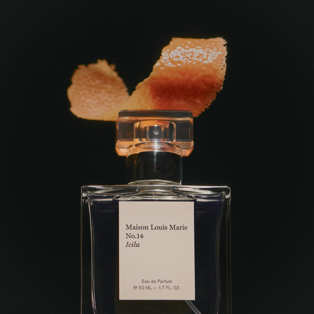 Icila application shot demonstrates 1-2 sprays at pulse points for everyday wear.