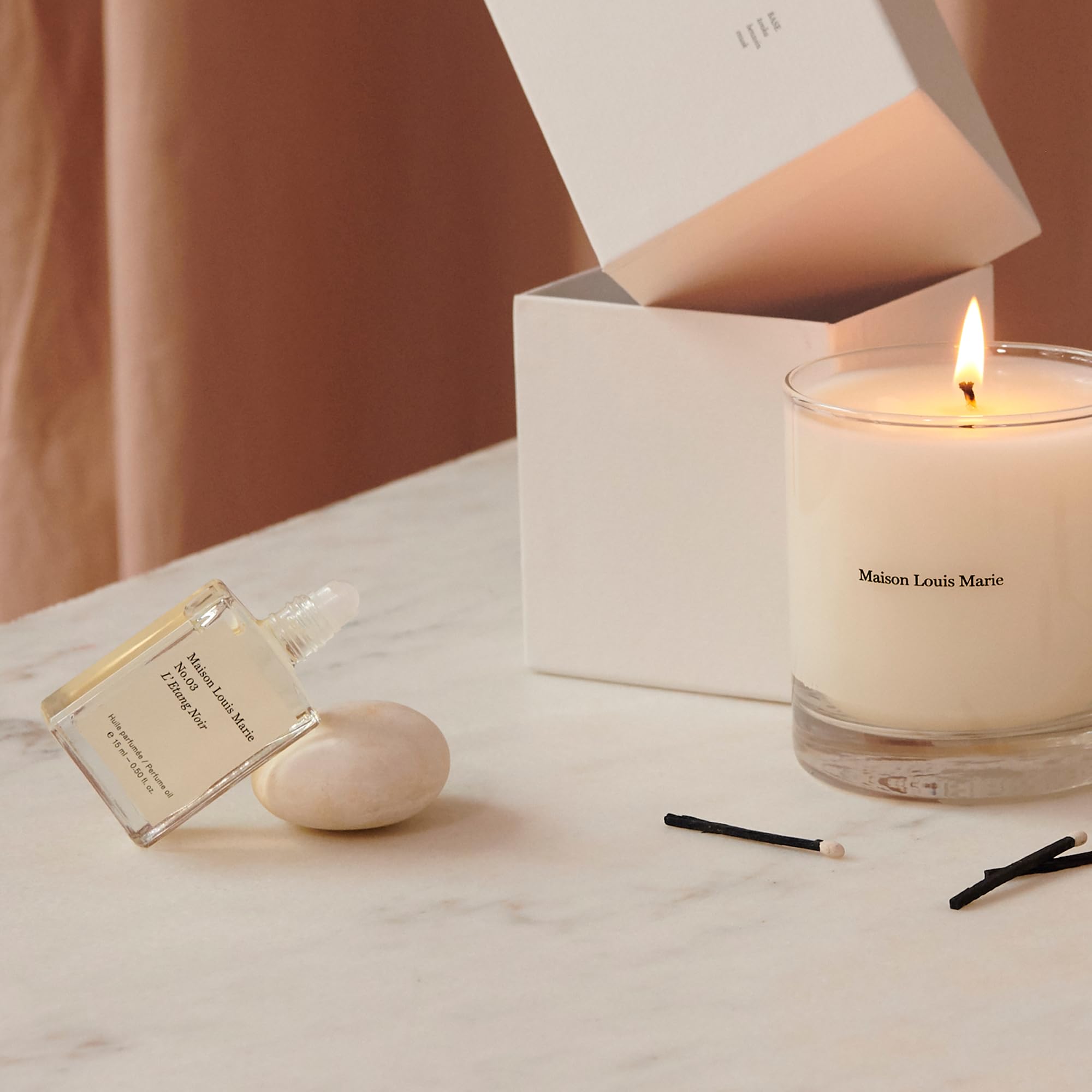 Gift-ready packaging of Maison Louis Marie No.3 Étang Noir roll-on.