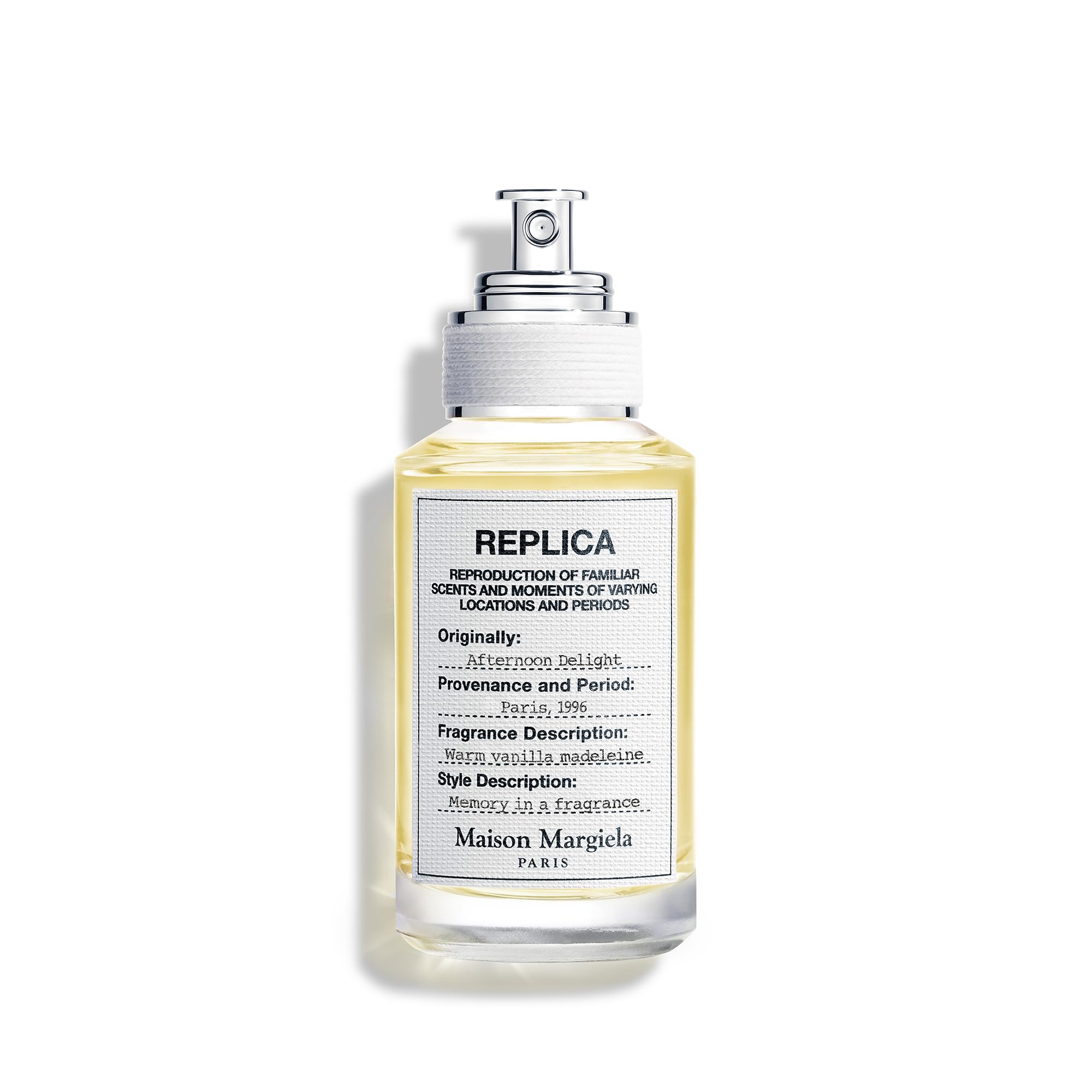 Maison Margiela Replica Afternoon Delight bottle closeup showing warm vanilla notes for cozy evenings.