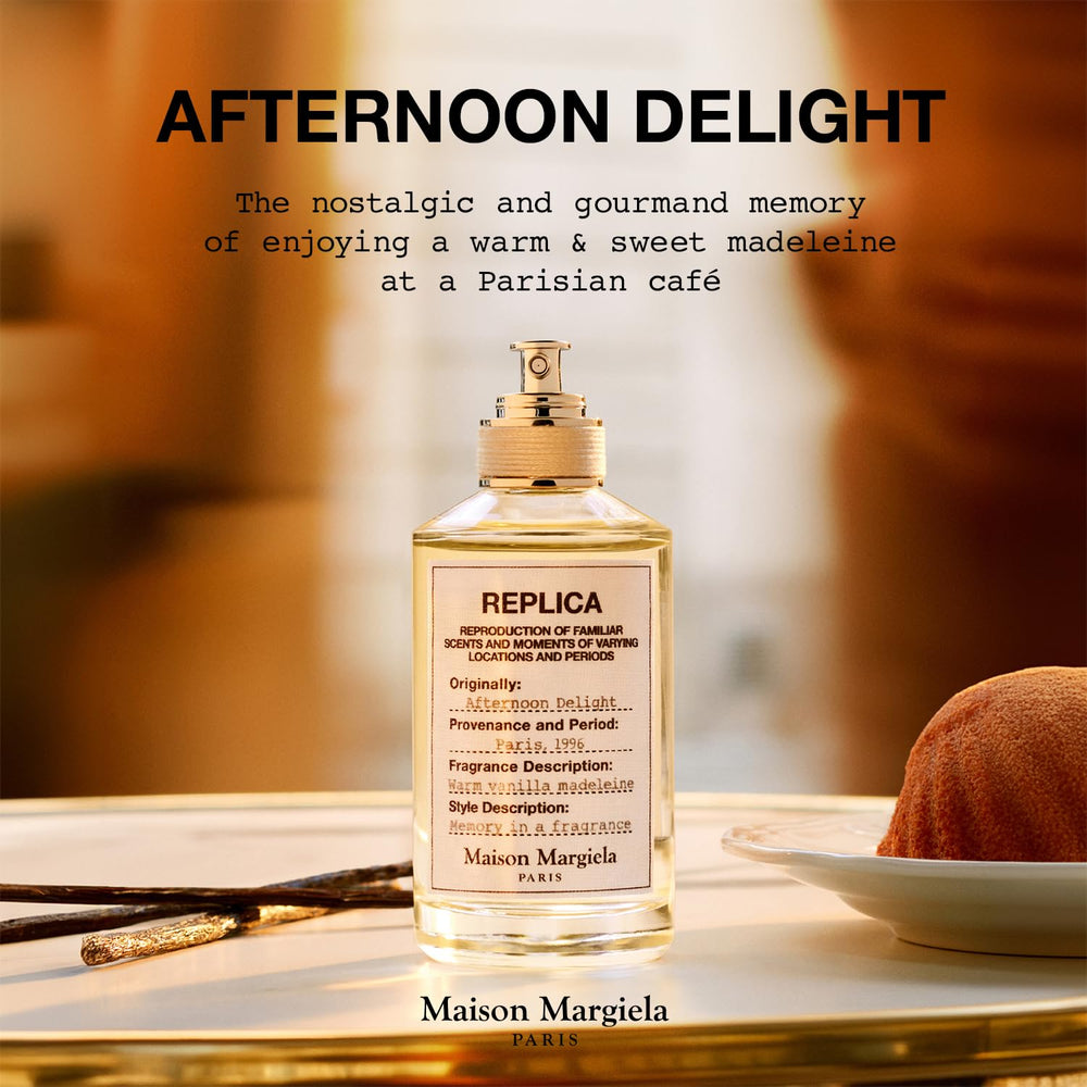 Maison Margiela Replica Afternoon Delight bottle swatch shows amber warmth.