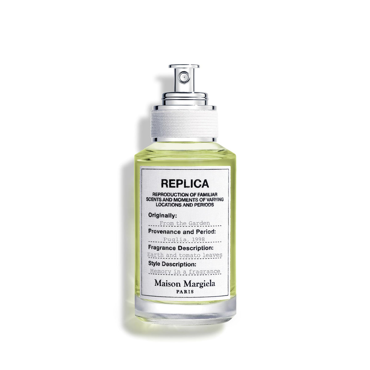 Maison Margiela Replica From the Garden bottle in sunlight evokes fresh daytime wear.